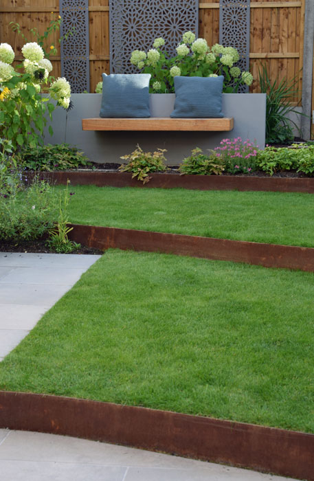 Grass terraces with corten edging